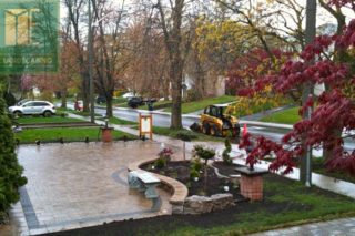 Driveway paving project with cedar deck