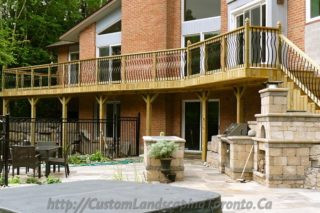 Landscaping project with Flagstone paving and deck